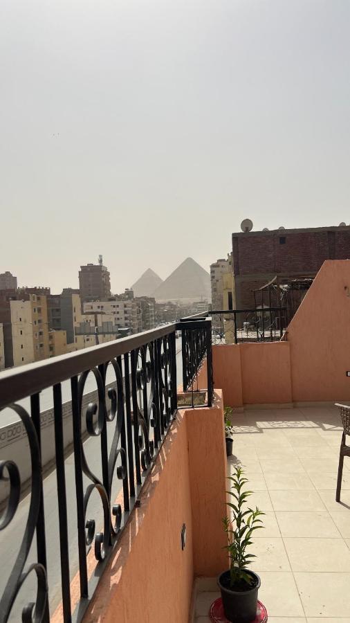Pyramids Road Guest House Cozy Rooms And Rooftop Breakfast With The Pyramids View Nazlet el-Sîsi 外观 照片