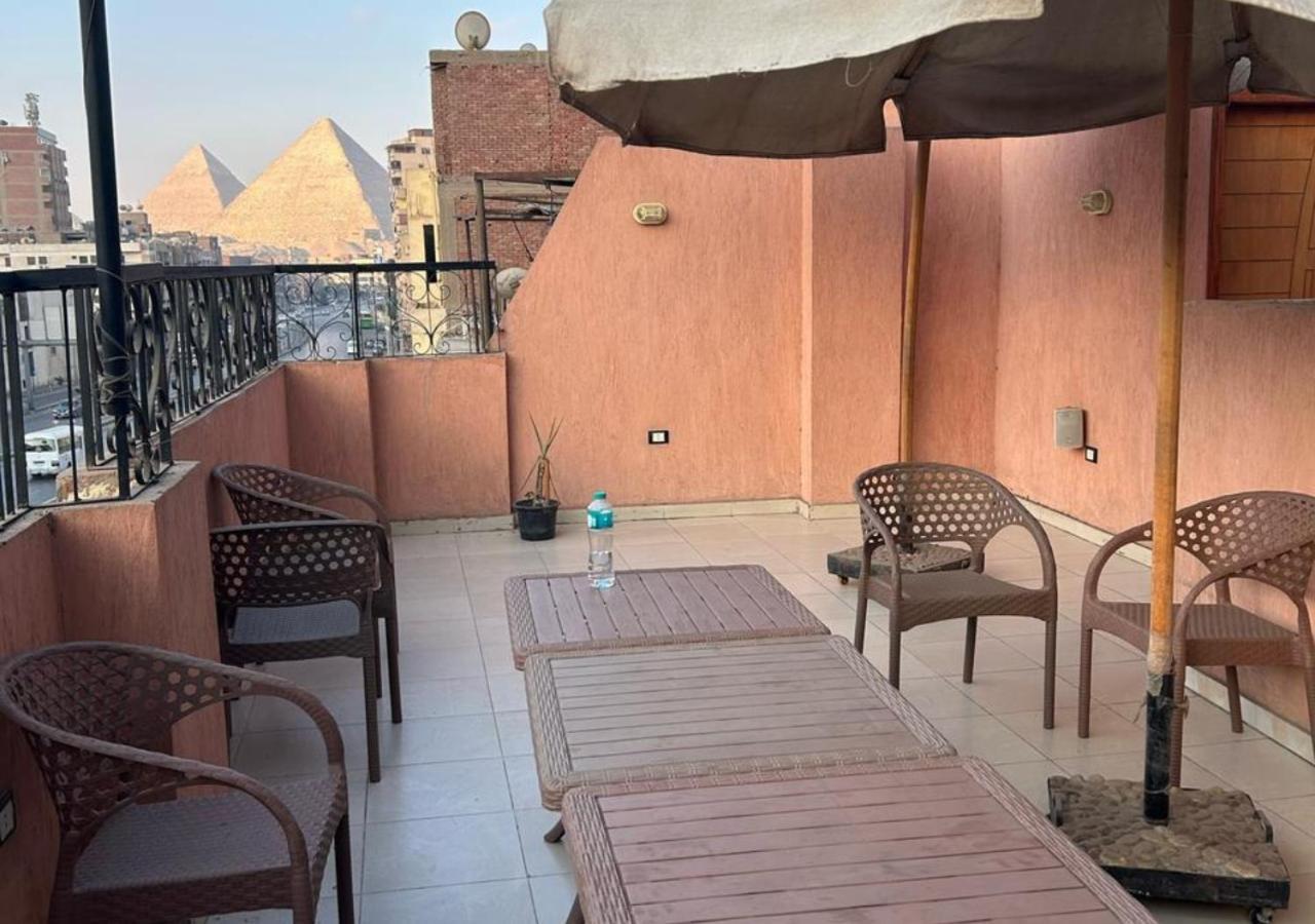 Pyramids Road Guest House Cozy Rooms And Rooftop Breakfast With The Pyramids View Nazlet el-Sîsi 外观 照片